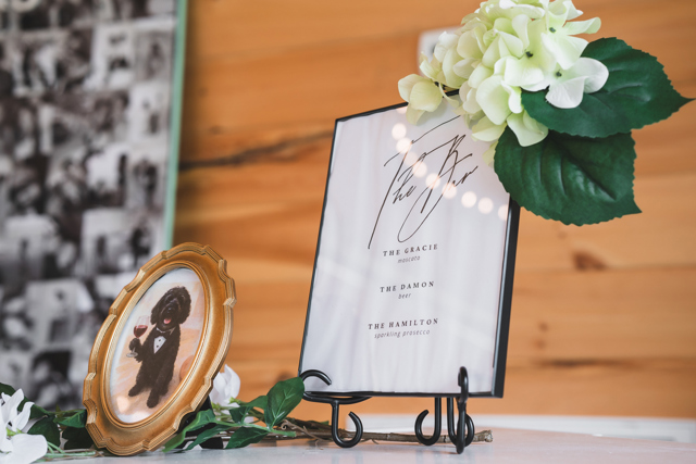 Paper details and florals on the welcome table