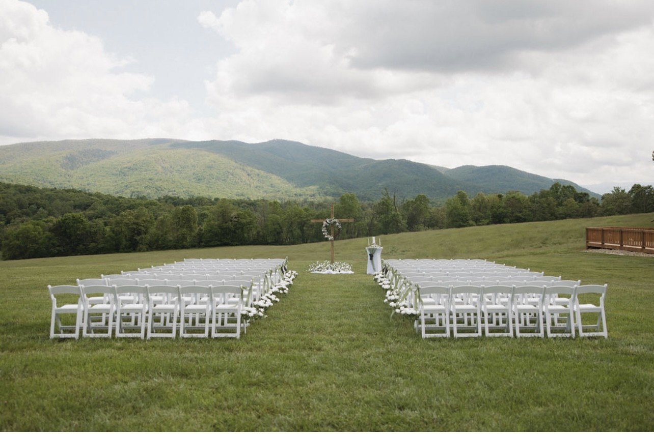 Ceremony chairs set facing the ridgeline