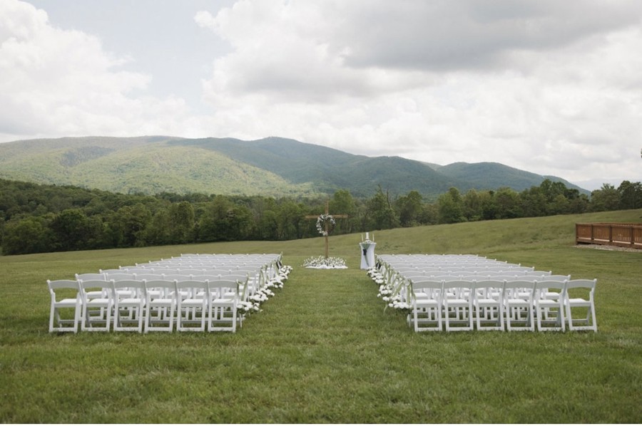 Ceremony chairs set facing the ridgeline